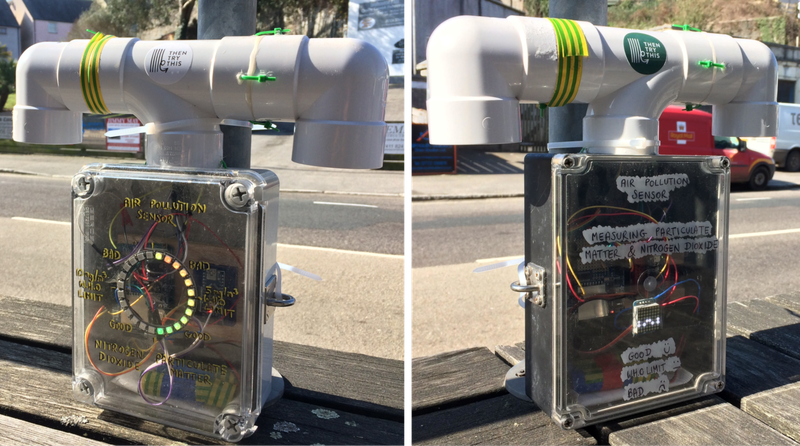 Two air pollution sensors made from plastic boxes and plumbing pipe