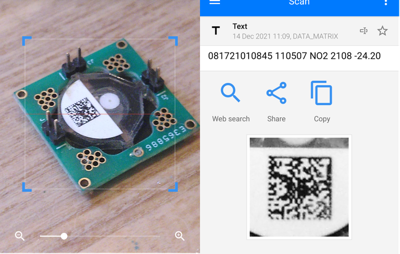 Close up of the sensor and the QR code being scanned in the app