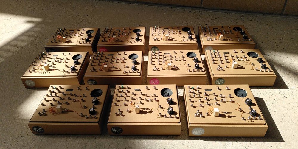 10 book sized cardboard boxes made into synth